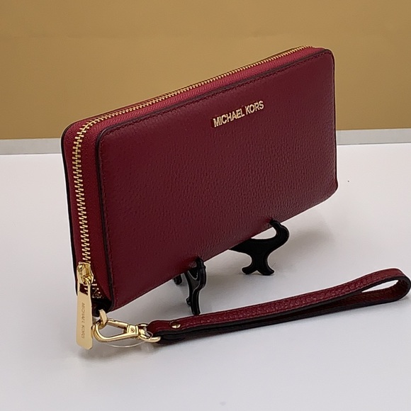 MICHAEL KORS
Leather Continental Wristlet Phone Case Wallet 
Oxblood 
NWT - Picture 10 of 16